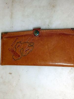 Vintage leather wallet or case used, brown color