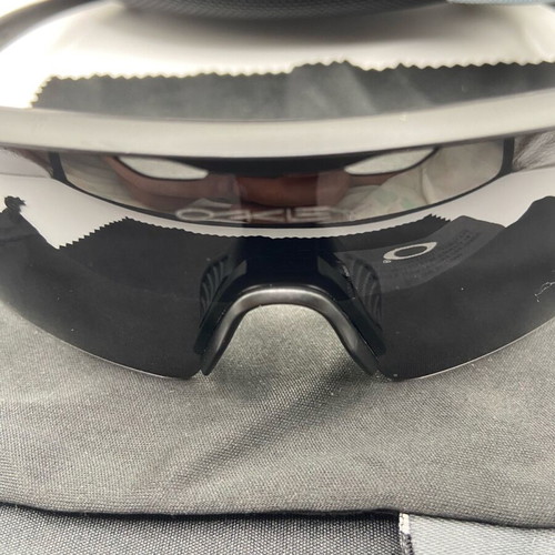 Oakley Sunglasses new with tags, black and silver