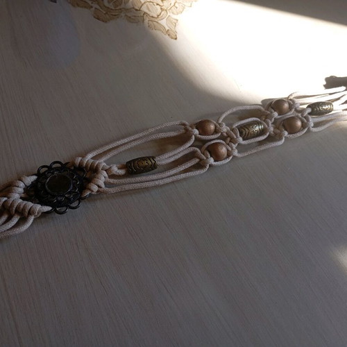 Adjustable belt used, missing one stone