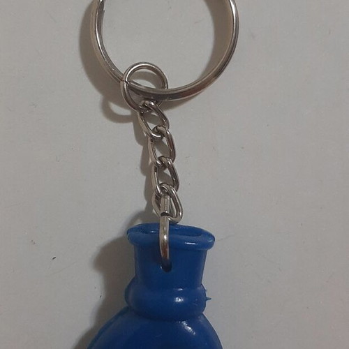 Vintage 80s flexible hand-shaped keychain, blue