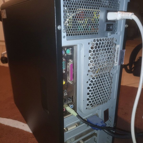 Asus computer tower used with stand and keyboard