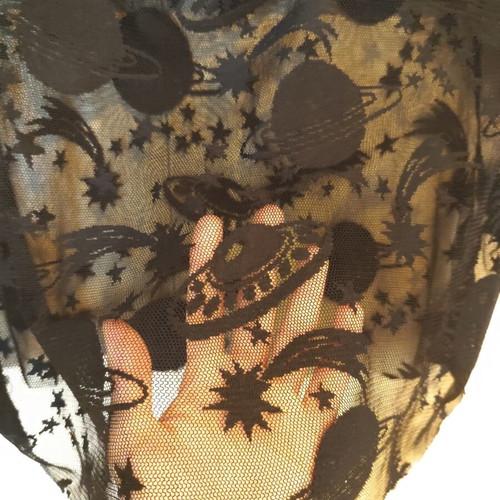 Sheer women's short-sleeve blouse with planet designs