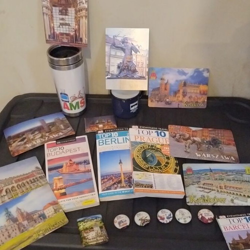 Travel memorabilia collection like new with books, magnets, cup, thermos, postcards, map
