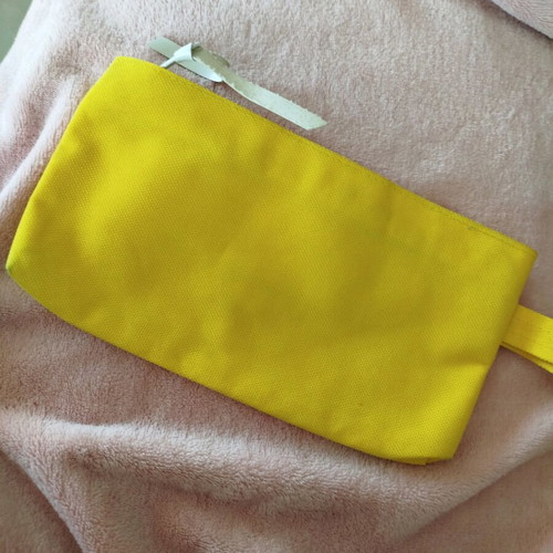 Orlane toiletry bag new, yellow