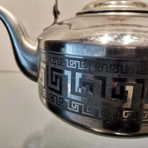 Teapot used with wooden handle and meander pattern