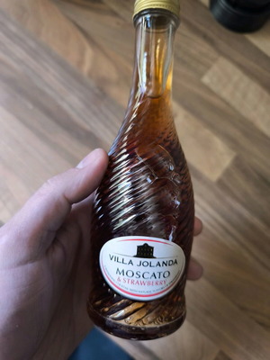 Moscato wine used, small bottle with strawberry, collectible