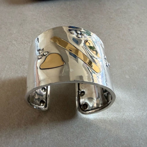 Silver and gold bracelet jewelry used