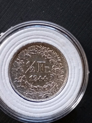 Silver Swiss half franc coin 1944 like new