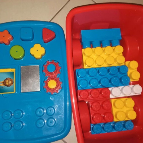 Pull and construction toy like new with cart and building blocks