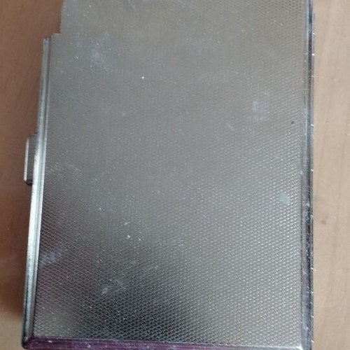 Metal cigarette case used with lighter holder