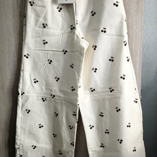 Arpyes jeans new with cherry design, size large, white and brown