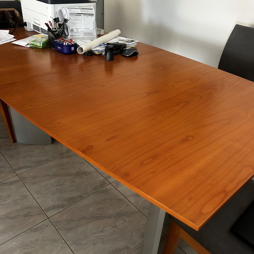 Solid wood dining table designed by Eleni Natsi