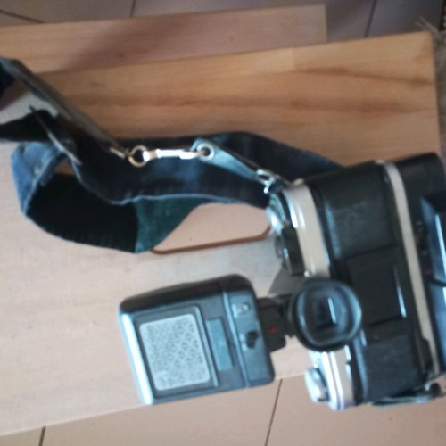 Canon AT-1 SLR μεταχειρισμένη με φακό Canon Lens FD 50mm 1:1.8, φλας Achiever και ιμάντα