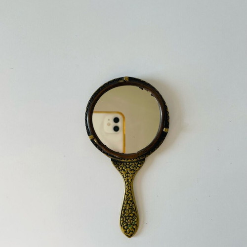Vintage brass hand mirror like new