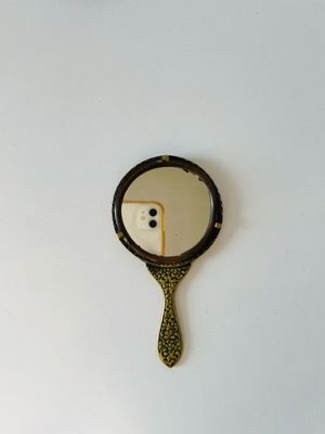 Vintage brass hand mirror like new