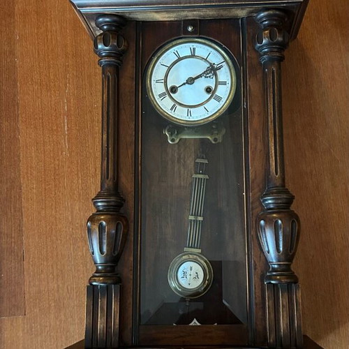 Wood-carved pendulum wall clock used, analog