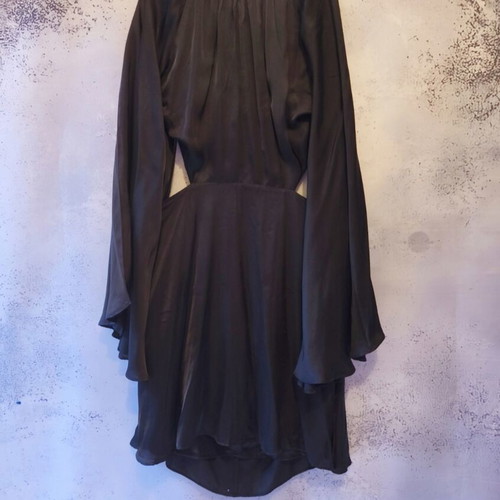 Black mini dress used with open back and bell sleeves, size S