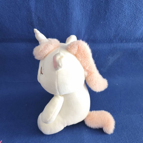 Small plush unicorn, pink and white