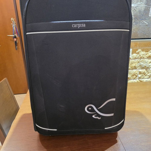 Carpisa 28" Travel Suitcase used, black semi-rigid fabric