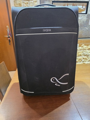 Carpisa 28" Travel Suitcase used, black semi-rigid fabric