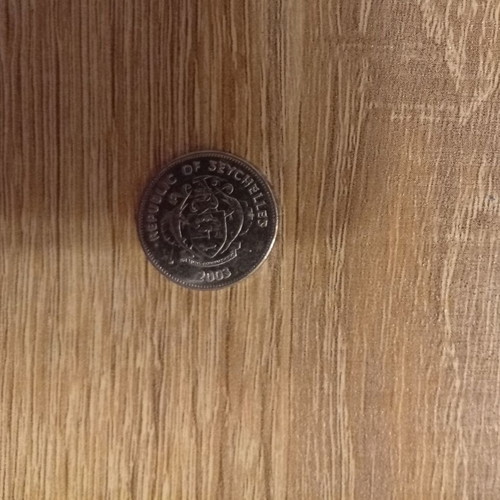 Seychelles 25 Cents Coin 2001 used, silver color
