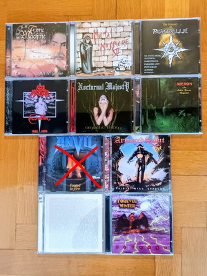 Metal CD pack new, 9 total with 8 single and 1 double