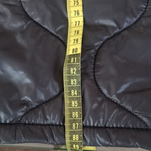 Long women's quilted black jacket like new