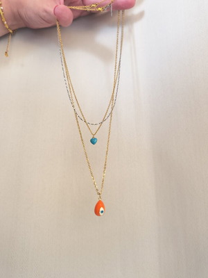 Women's necklace with eye and heart pendants