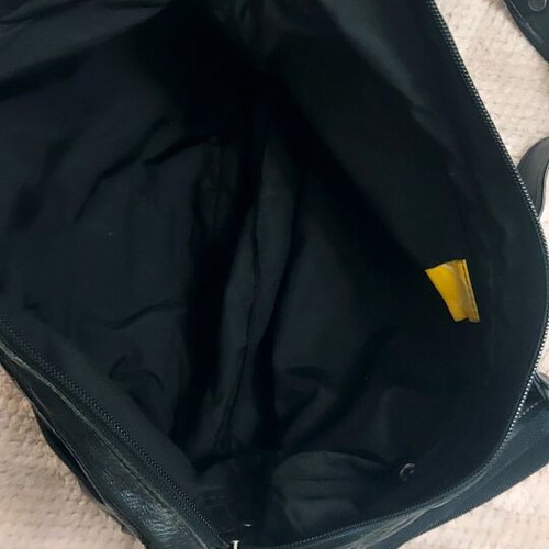 Mandarina Duck leather bag black like new with castor and pony skin
