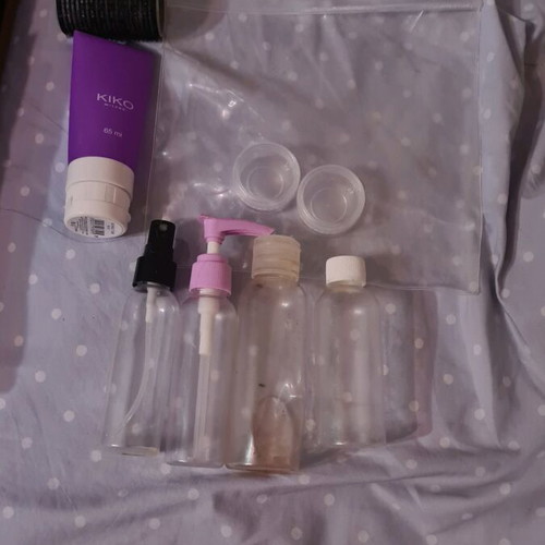 Travel empty bottles and accessories like new