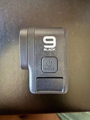 GoPro Hero 9 Black action camera with case and battery