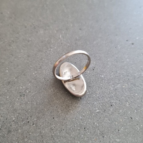 Vintage ring with green oval cut stone