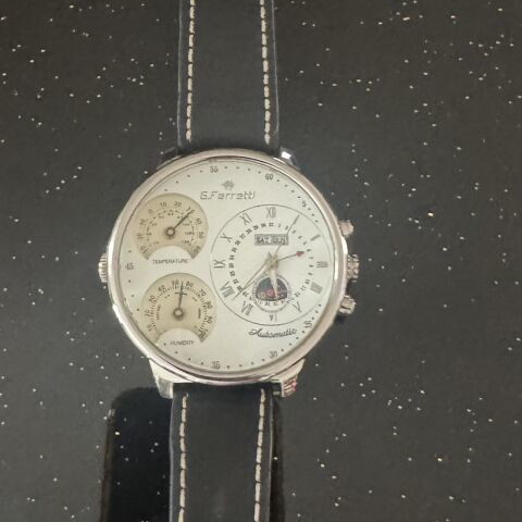 G.Ferreti automatic watch like new with date, moon phases, temperature, humidity