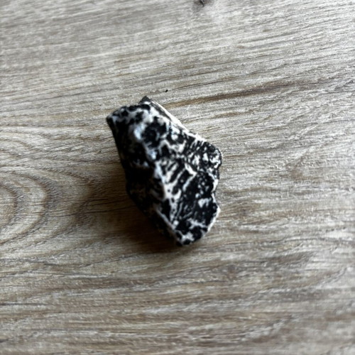 Zebra Stone natural rock with black and white geometric patterns