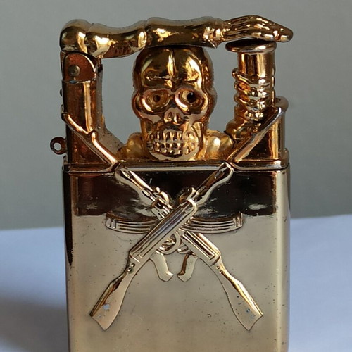Vintage metal windproof lighter with skull and crossed rifles
