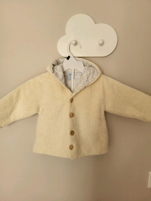 Baby jacket for 12 months like new, plaid inside and furry outside
