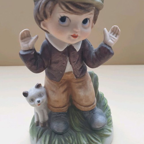 Capodimonte figurine boy with puppy like new