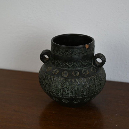 Decorative ceramic vase in ancient style with geometric motifs