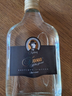 Tipota sealed collectible bottle Greek liqueur
