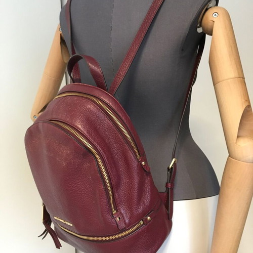 Michael Kors genuine leather backpack used, red