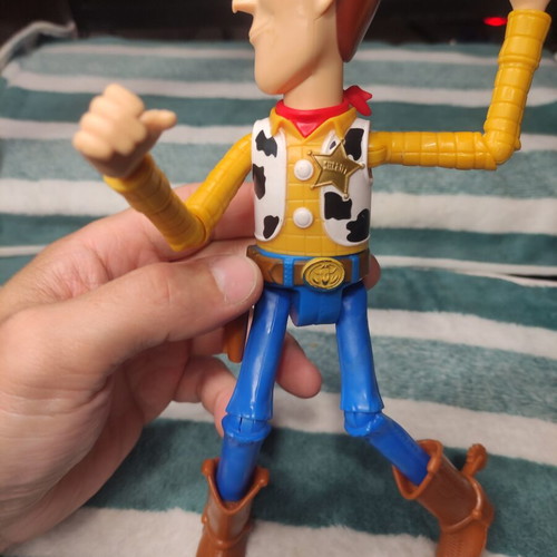 Woody action figure from Toy Story 23cm used, missing hat and nose damage