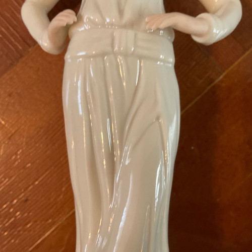 Regal Porcelain Statue