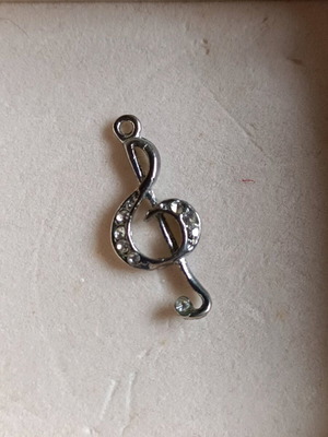 Silver Treble Clef Pendant like new with sparkling rhinestones