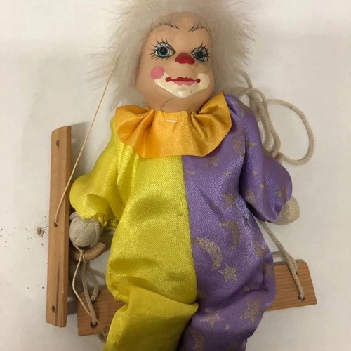 Vintage wooden puppet clown doll used