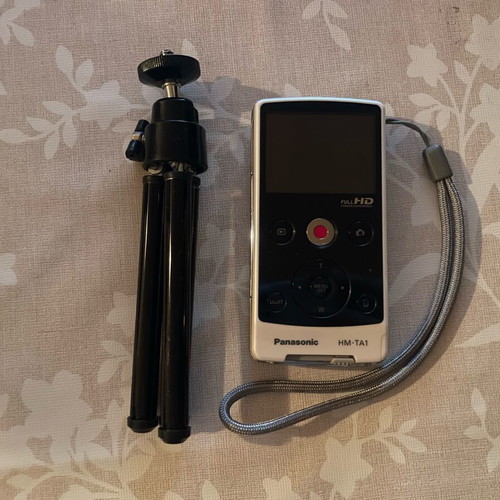 Panasonic HM-TA1 Full HD video camera used with mini tripod