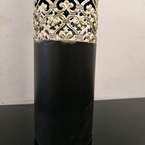 Metal vase in black color with bronze designs like new