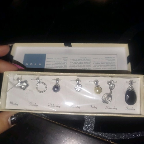 Calendar by AVON necklace set new, silver, in case