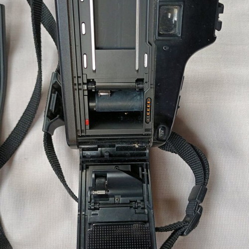 Minolta Maxxum 5000i analog 35mm camera used with 2 lenses