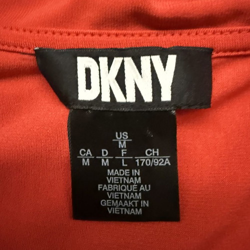 DKNY sleeveless blouse with draped wrap design, size M, like new