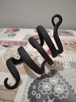 Metal black bracelet with tentacle design like new